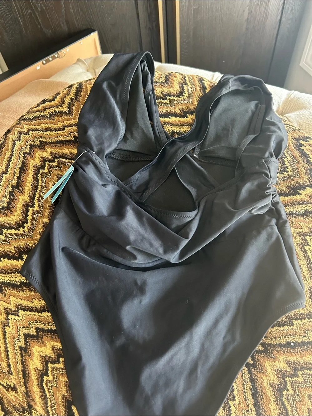 Sleek Black One-Piece Swimsuit with Tummy Ruching